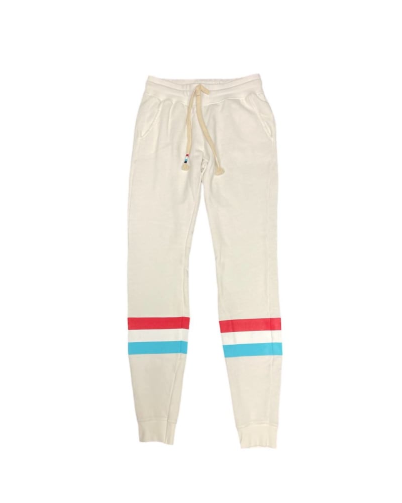 Front of a model wearing a size L Stripe Jogger In White in White by SOL ANGELES. | dia_product_style_image_id:355972